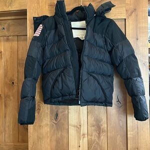 Black Ralph Lauren winter jacket with American flag arm patch